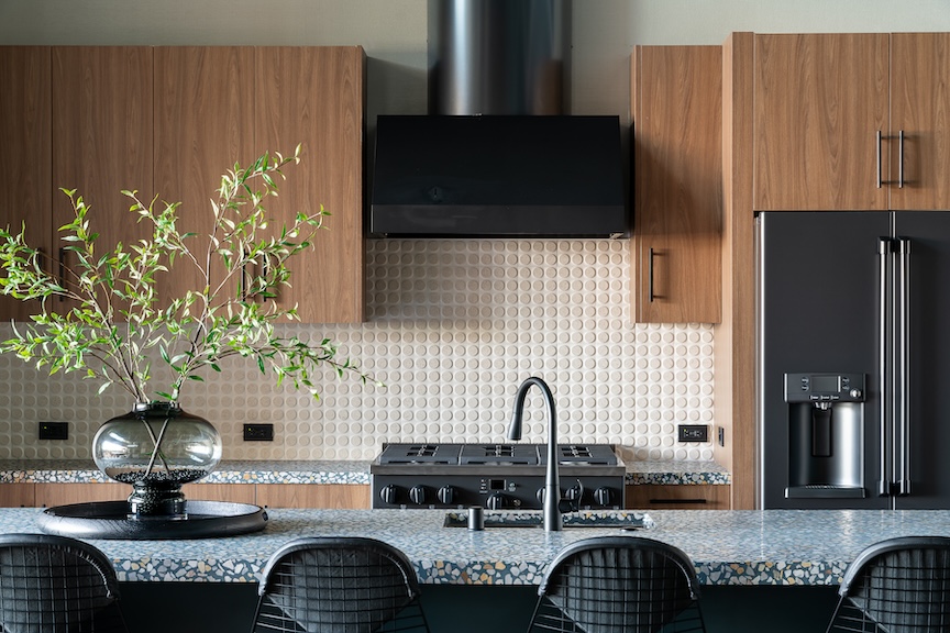 Clubroom Kitchen at Apollo Apartments.  Backsplash Tile by Ann Sacks.  Interior Design by Nadia Geller Designs